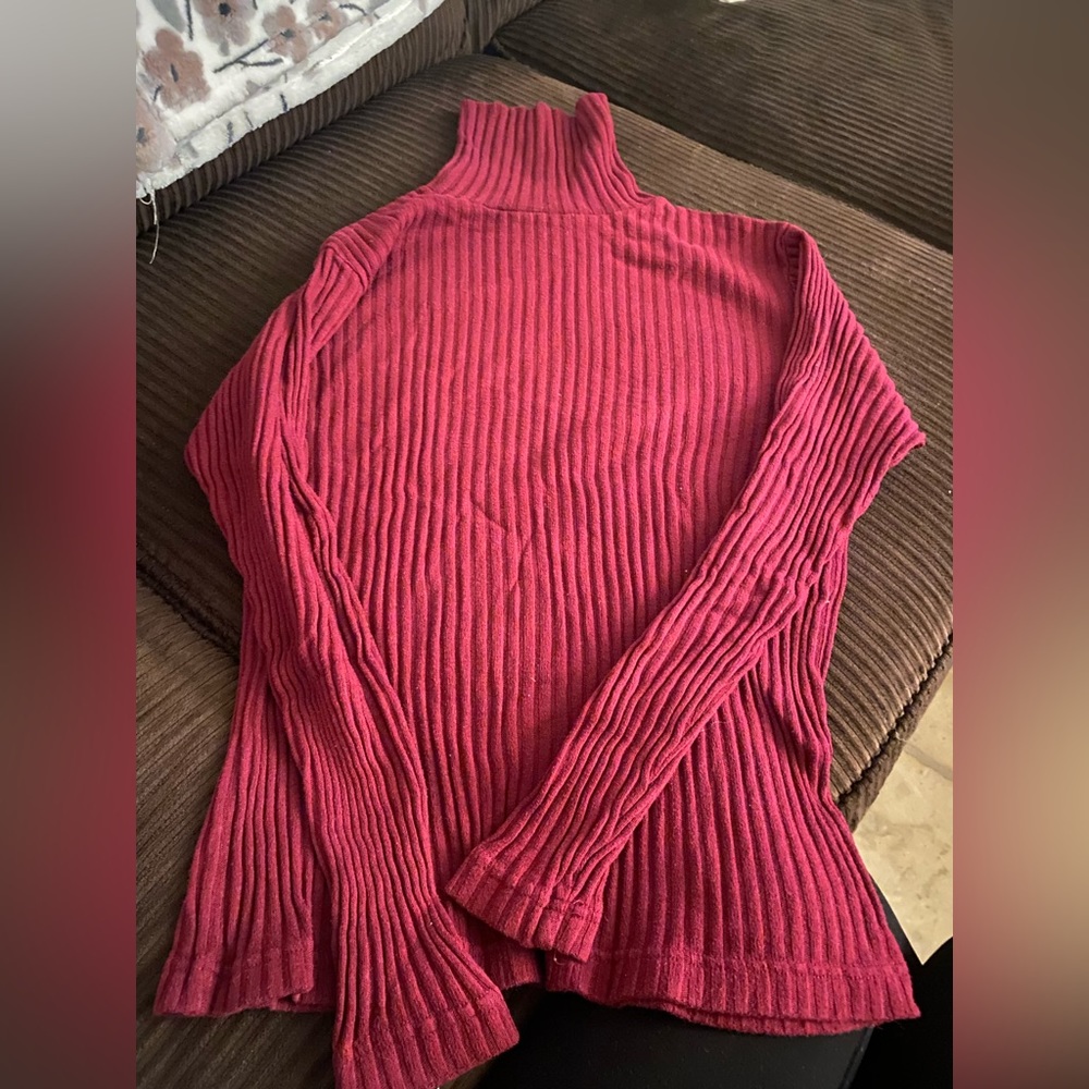 Red ribbed turtleneck sweater